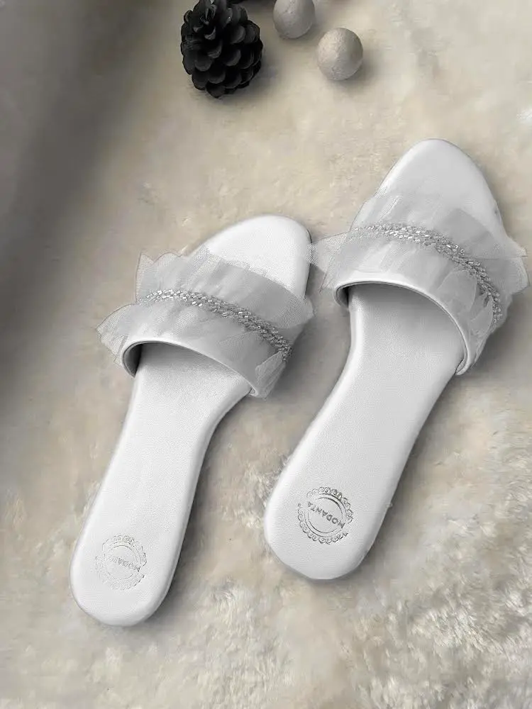 White Ruffle Flats_Angular.webp